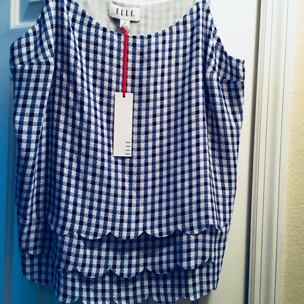 Super cute Elle strappy. Tiered scalloped hem